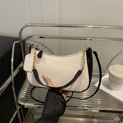 Sac bandoulière tendance et uni