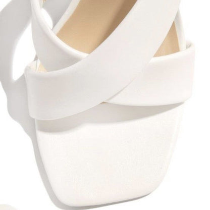 Mules délicates à talons hauts